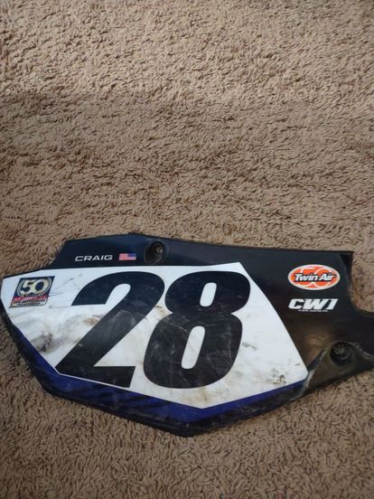 Christian Craig signed side number plate.