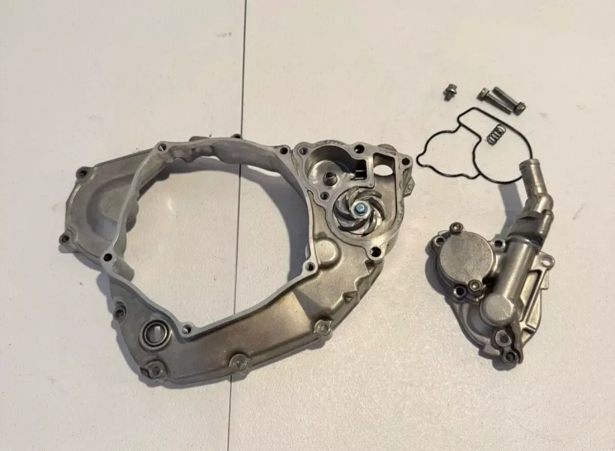 Kawasaki OEM inner clutch cover water pump oil filter case 21-24 kx 250 250x 2