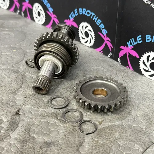 1985 suzuki quadracer 250 OEM KICKSTART KICK START GEARS SHAFT IDLE GEAR STARTER
