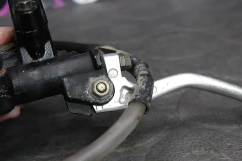 1995 Honda 92-98 CR125R OEM FRONT BRAKE CALIPER MASTER CYLINDER LEVER