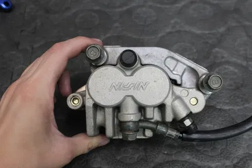 2002 Yamaha YZ125 OEM FRONT BRAKE CALIPER MASTER CYLINDER W LEVER