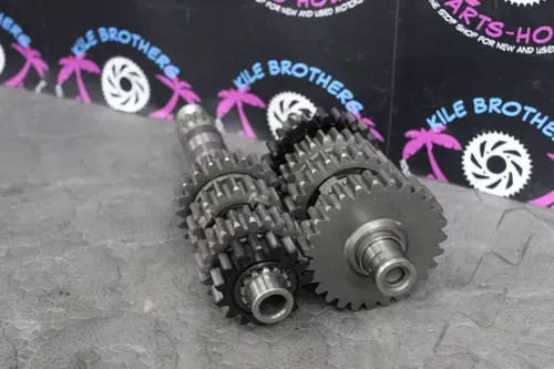 06-09 yamaha yz450f OEM ENGINE TRANSMISSION INPUT OUTPUT SHAFT ASSEMBLY GEARS