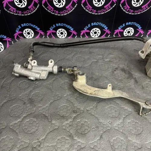 2003 YAMAHA YZ125 OEM NISSIN REAR BACK BRAKE CALIPER MASTER CYLINDER ASSEMBLY