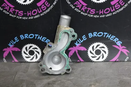 2014 kawasaki 06-15 kx450f OEM ENGINE WATER PUMP HOUSING COVER 16142-0735