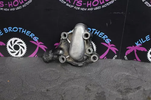 1989 honda cr125r OEM ENGINE WATER PUMP HOUSING COVER 19240-KS6-700