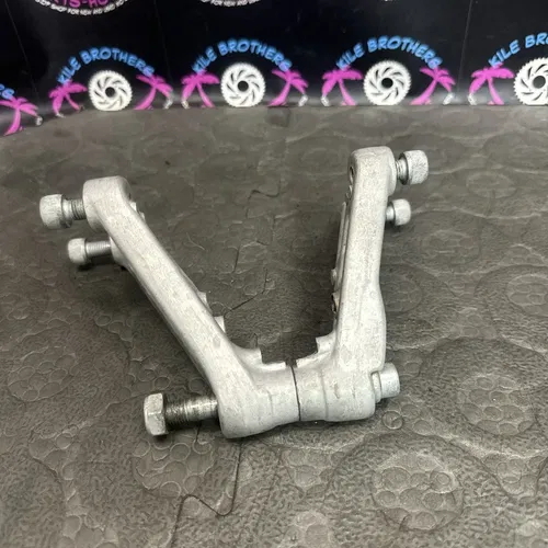 1991 kawasaki 90-91 kx250 OEM REAR SHOCK UPPER MOUNTING BRACKETS