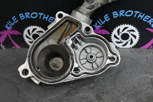 2005 suzuki rmz250 OEM ENGINE WATER PUMP HOUSING COVER oil filter cover