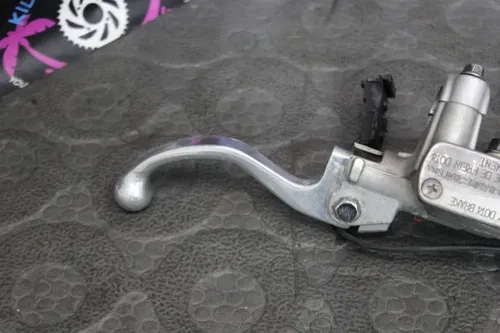 2004 honda 04-17 crf250x OEM FRONT BRAKE CALIPER LEVER 45150-MEN-006