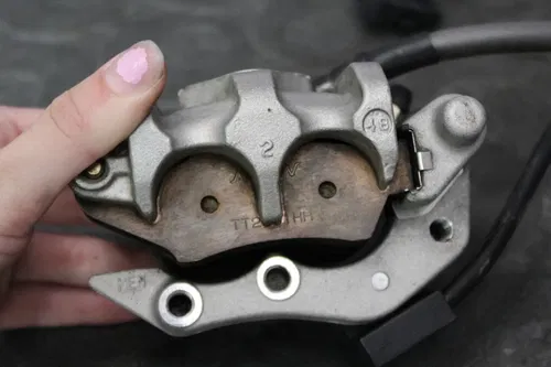 2004 honda 04-17 crf250x OEM FRONT BRAKE CALIPER LEVER 45150-MEN-006