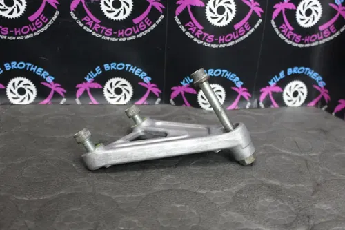 1991 KAWASAKI 90-91 KX125 OEM LEFT REAR BACK SHOCK MOUNT BRACKET 32037-1524