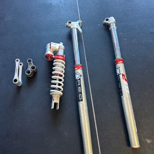 Cone Valve Fork 
Trax Shock 
Rep Linkage 